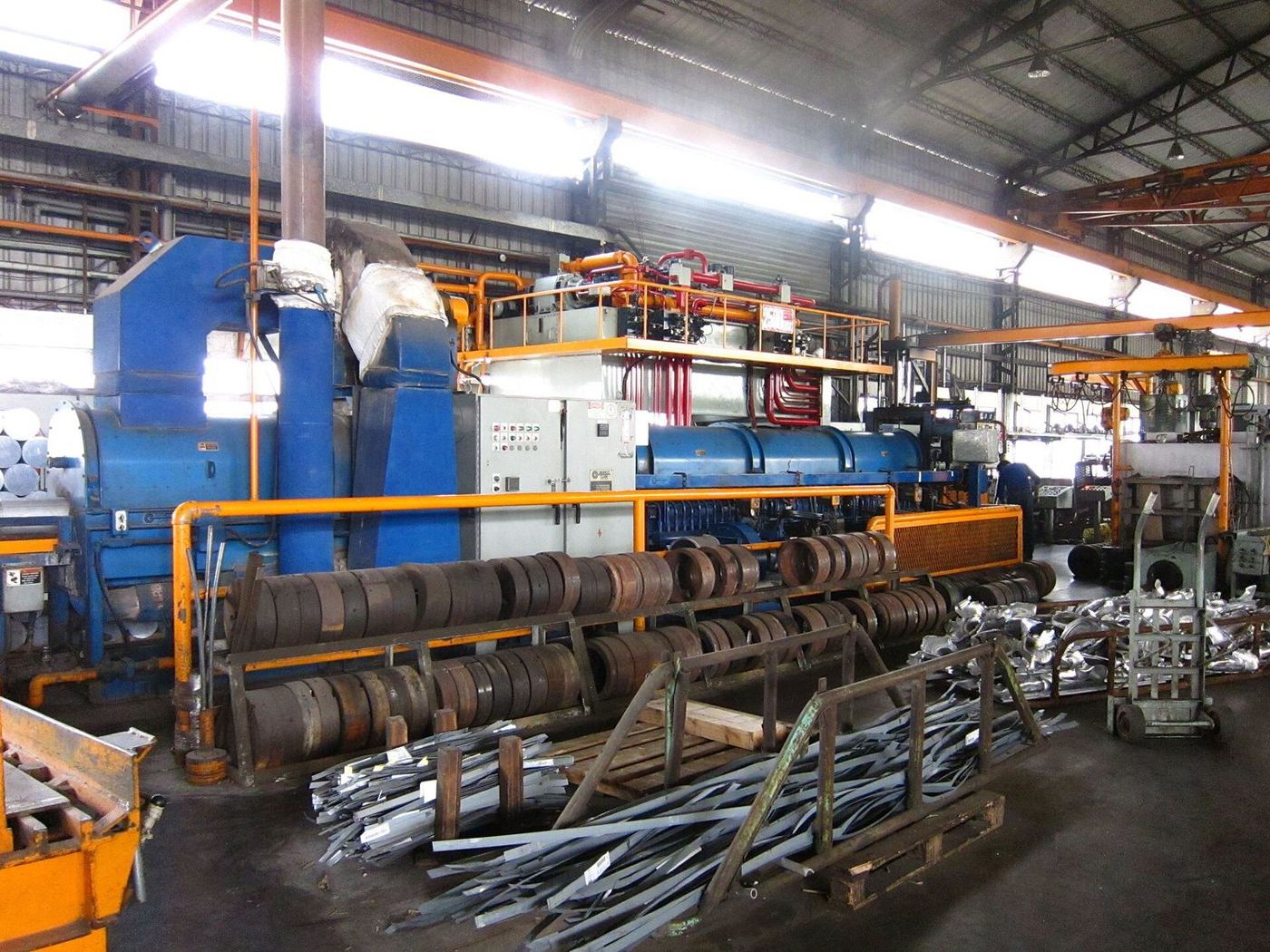 Aluminium extrusion press with dies.